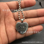 Chrome Hearts heart-shaped sword cross pendant