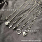 Chrome Hearts heart-shaped sword cross pendant