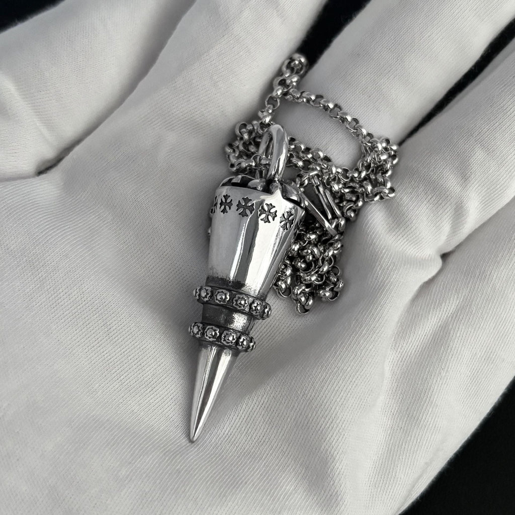 Chrome Hearts distressed cross rivet bullet pendant
