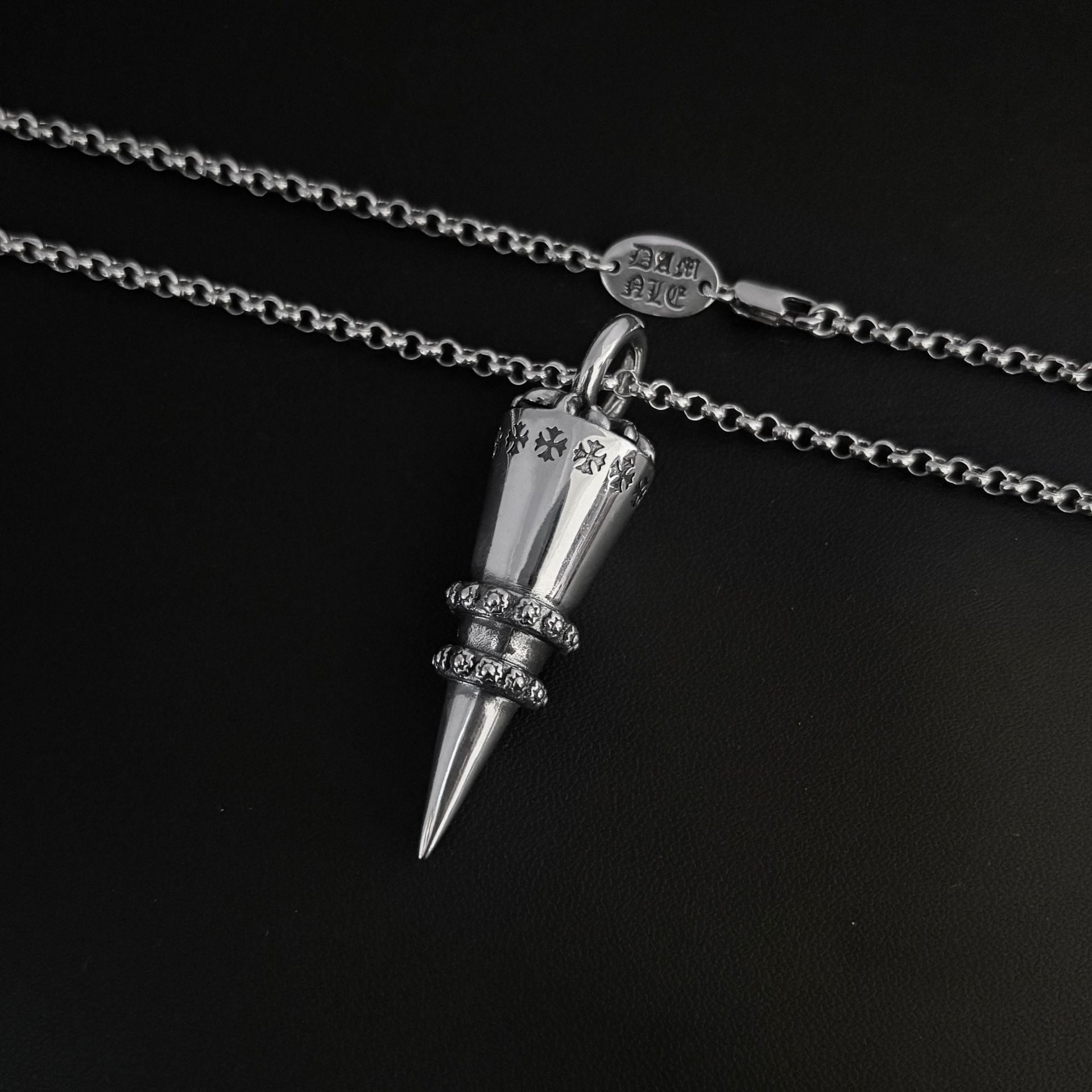 Chrome Hearts distressed cross rivet bullet pendant